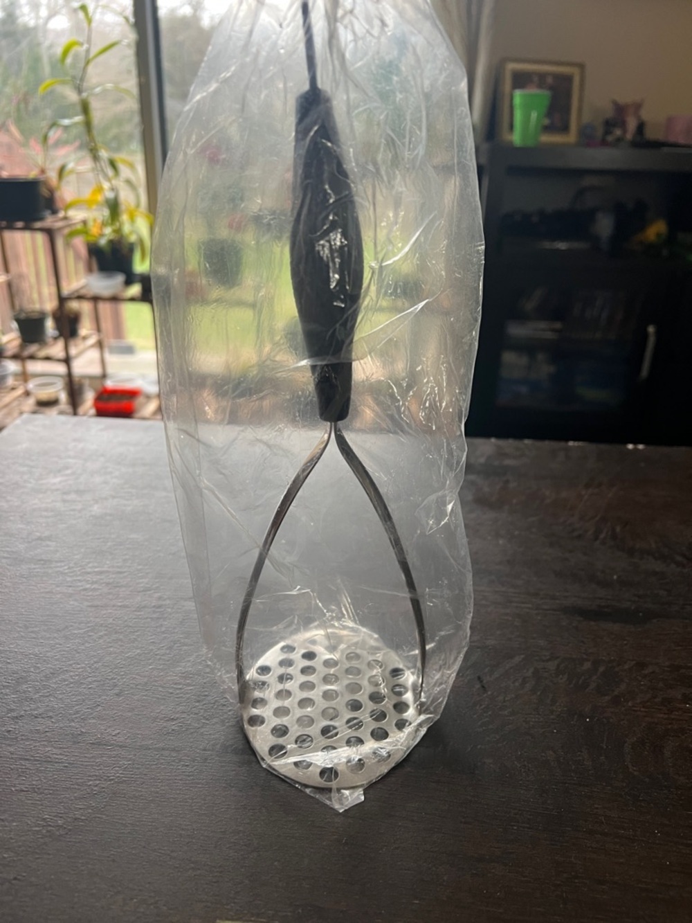Stainless Steel Potato Masher with Black Handle